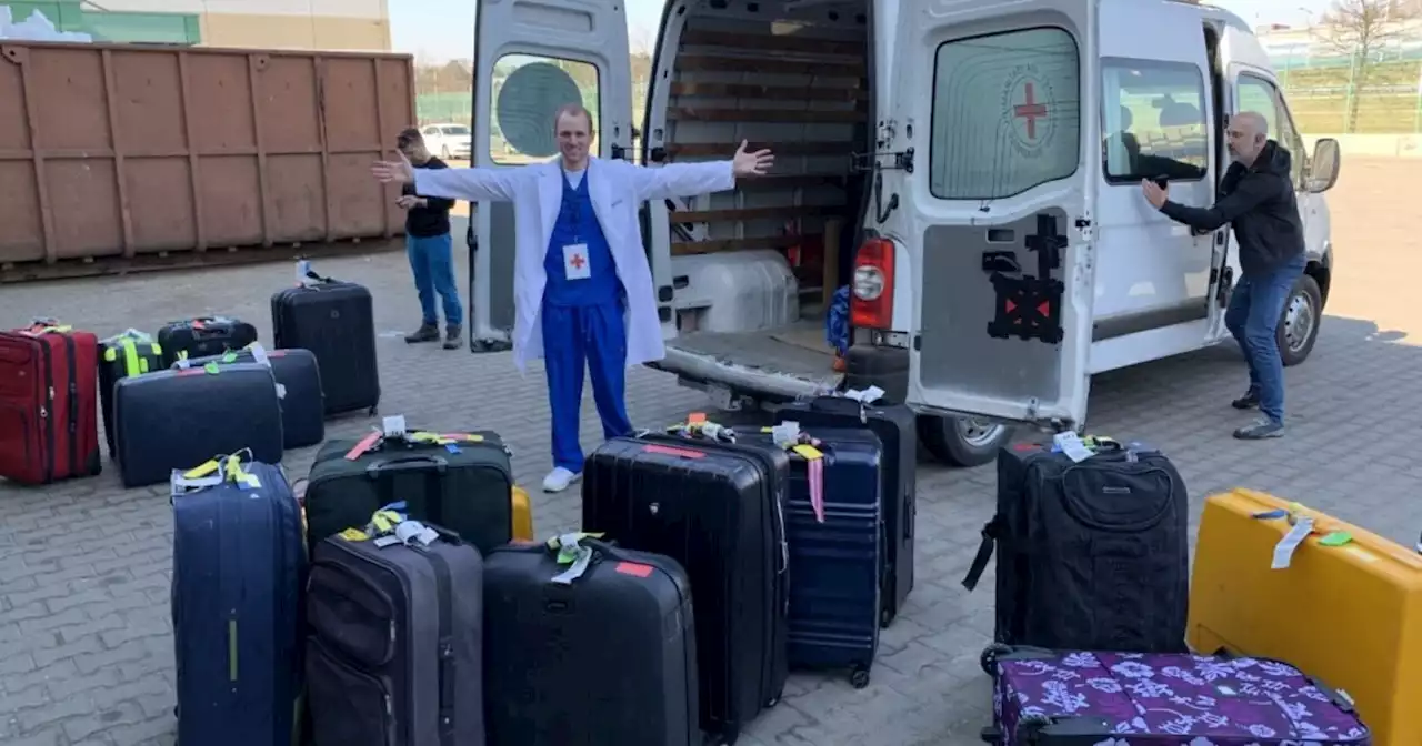 Tooele doctor treating orphans in Ukraine welcomed home by entire family at SLC airport