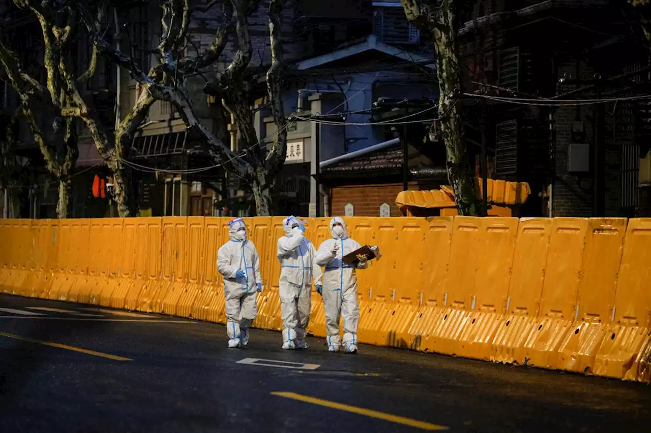 Shanghai to lock down in two stages for testing as COVID-19 cases spike