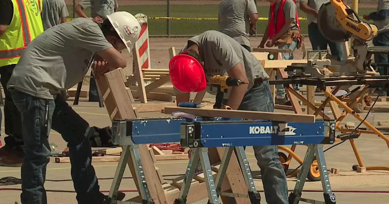 High school students network with industry professionals at construction competition