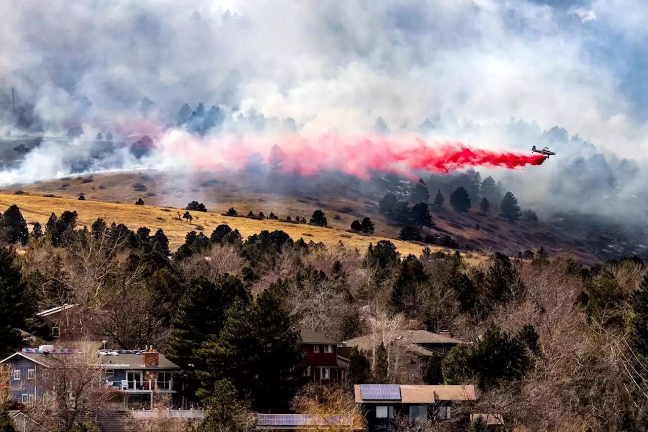 Western heat wave sets records, fuels fire near Boulder, Colo.