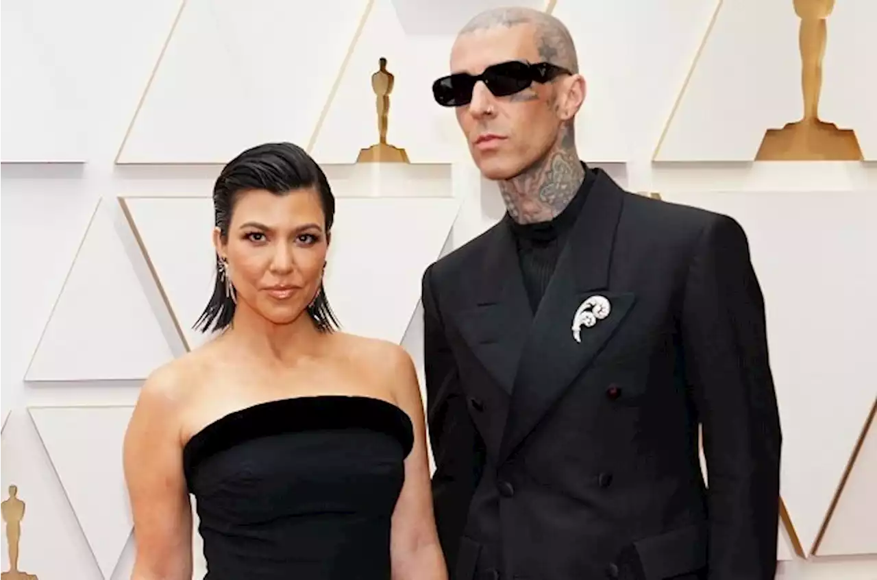 PHOTOS | Kourtney Kardashian and Travis Barker pack on the PDA at the Oscars | Channel