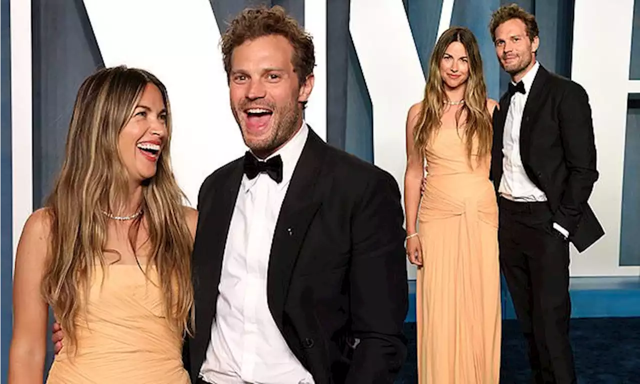 Jamie Dornan's wife Amelia Warner wows in draped peach gown