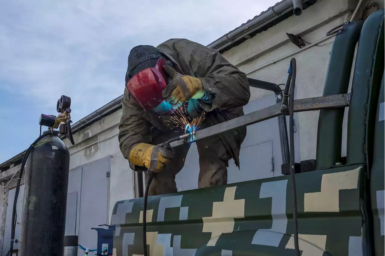 Ukrainian Welders Turn Donated Vehicles Into Army Transport