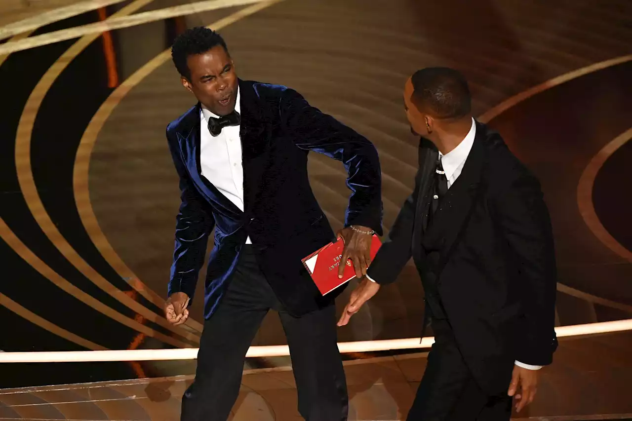 Will Smith Confronts Chris Rock on Oscars Stage After Comedian Makes Joke About Jada Pinkett-Smith