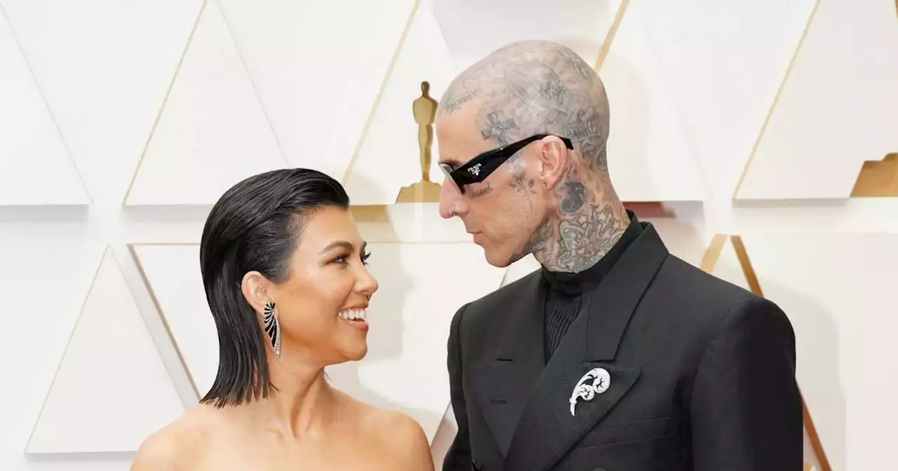 Kourtney Kardashian and Travis Barker co-ordinate in black on Oscars red carpet