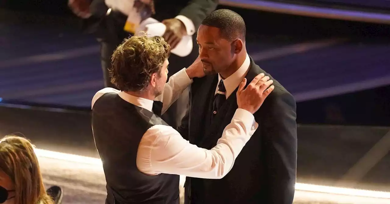 Will Smith ‘calmed down’ by Bradley Cooper after hitting Chris Rock at Oscars