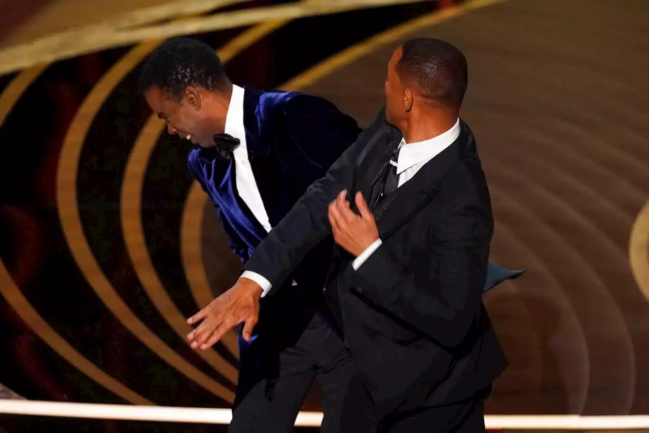 Will Smith slaps Chris Rock during Oscars after comedian tells G.I. Jane joke involving Jada Pinkett Smith