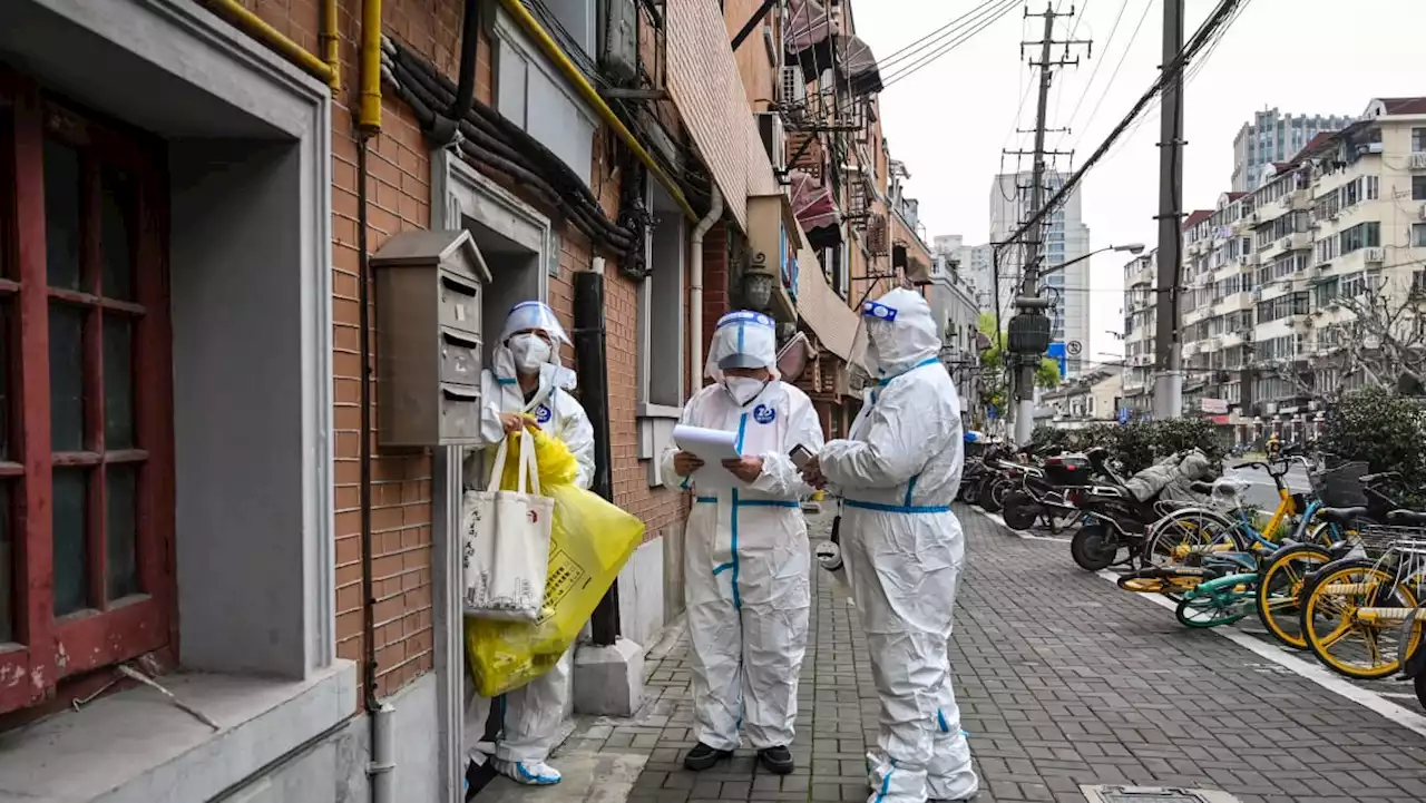 Shanghai to lock down in phases to rein in Covid-19 outbreak