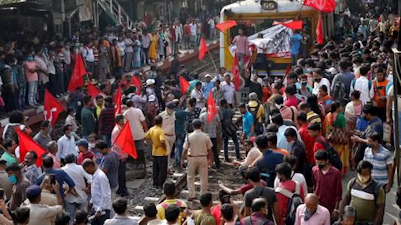 Millions of workers in India strike for labour rights, better pay