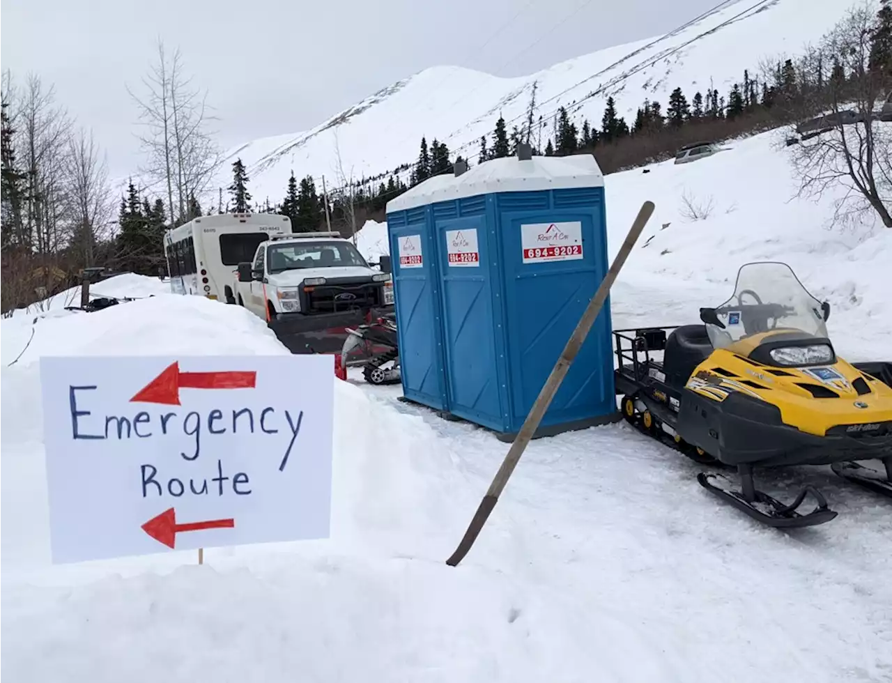 Cut off by avalanche, Hiland Road residents lean on snowmachine shuttle and each other - Alaska Public Media