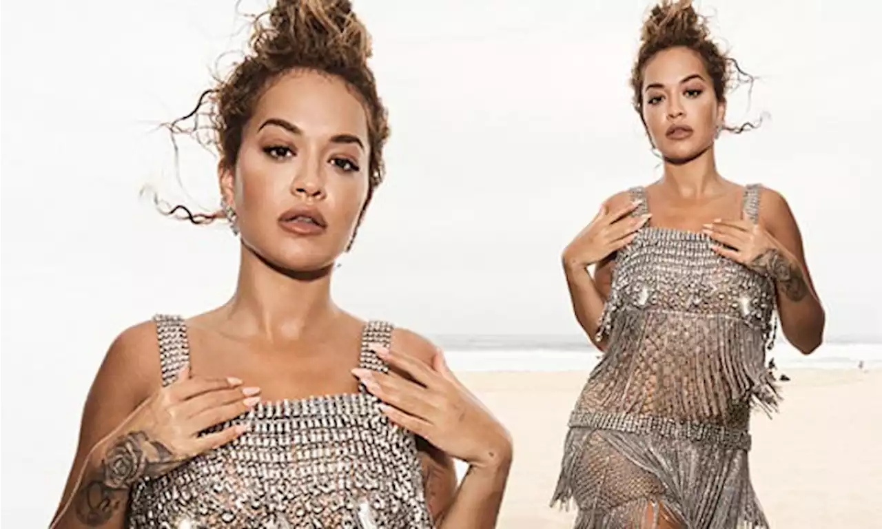 Rita Ora sizzles in a sheer silver tassel dress to pose for shoot