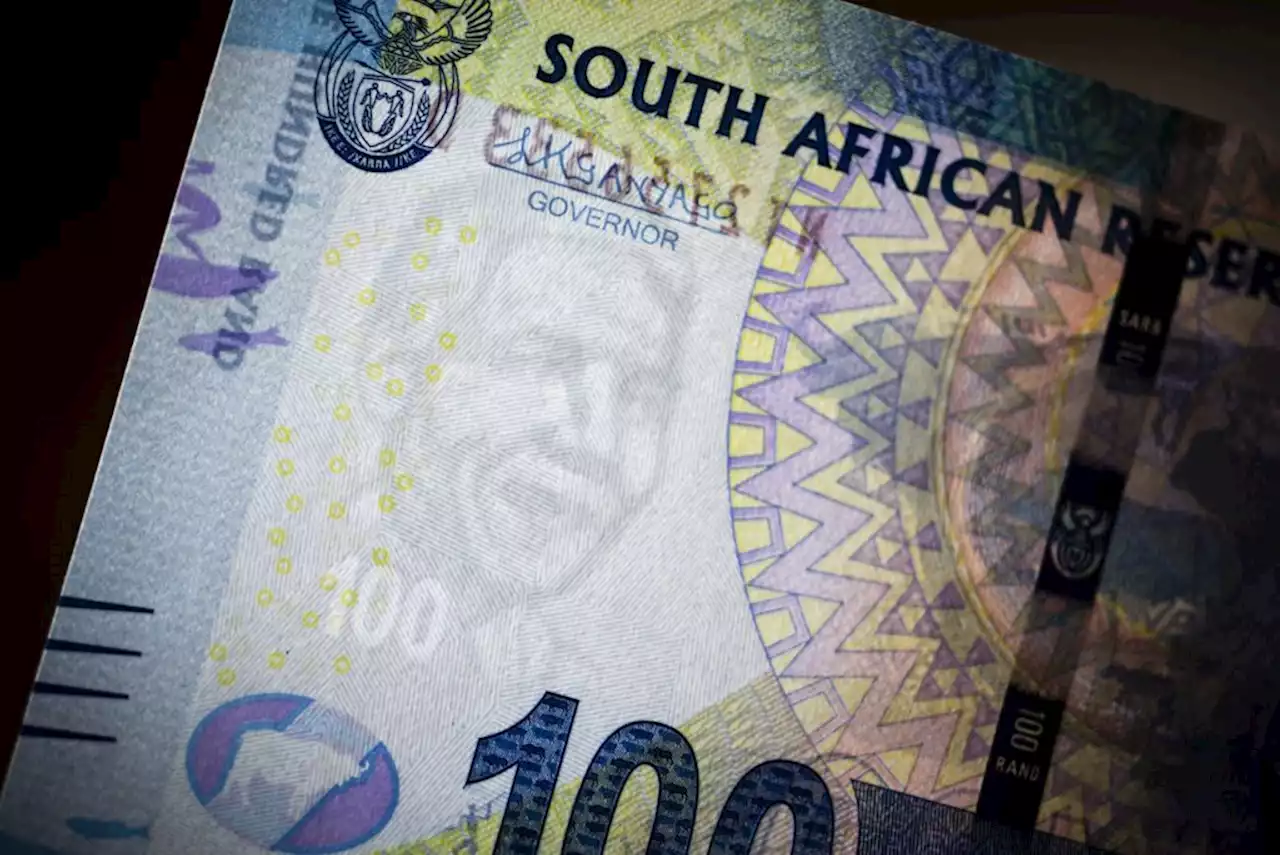 Rand firms in early trade