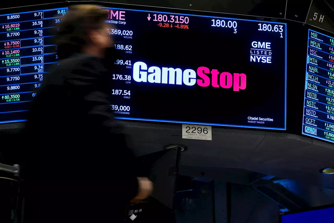 Stocks Making the Biggest Moves Midday: GameStop, Uber, Nielsen Holdings and More