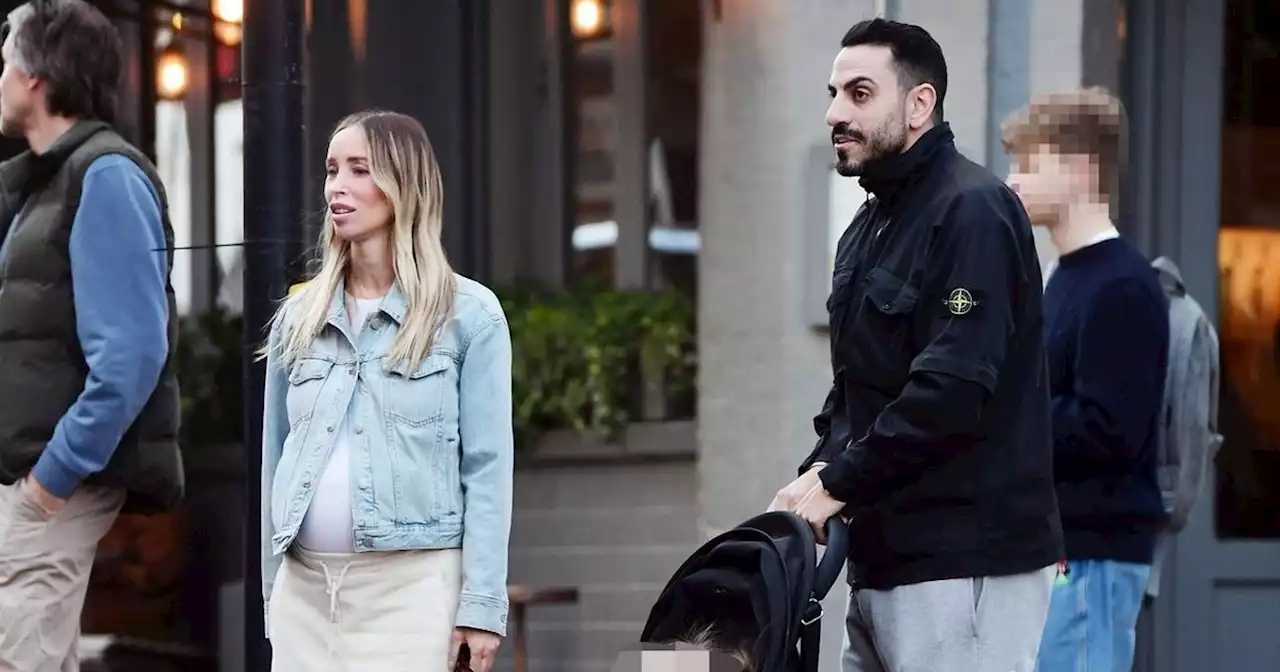 Lauren Pope displays baby bump on family outing with boyfriend and daughter