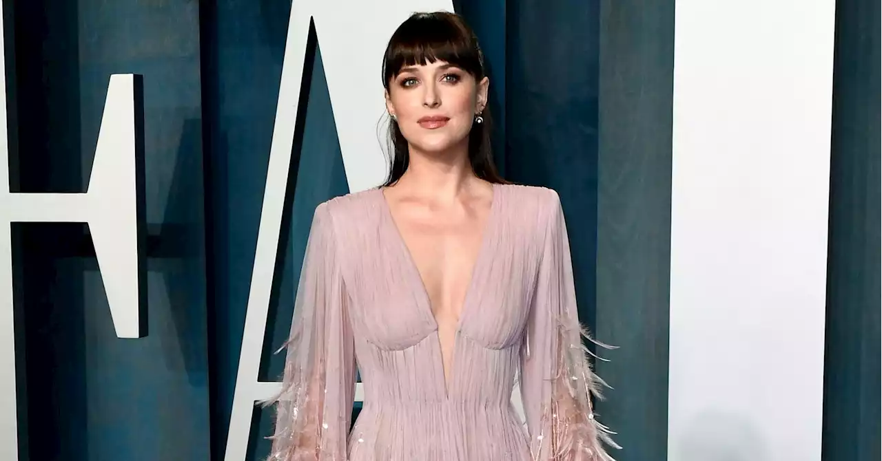 Dakota Johnson got rid of her trademark curtain bangs at last night’s Oscars