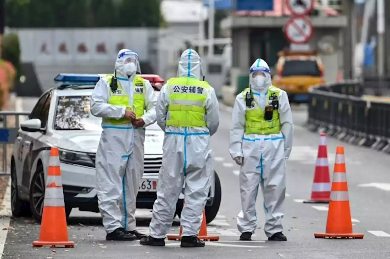 Anxiety and empty shelves as Shanghai Covid-19 cases surge