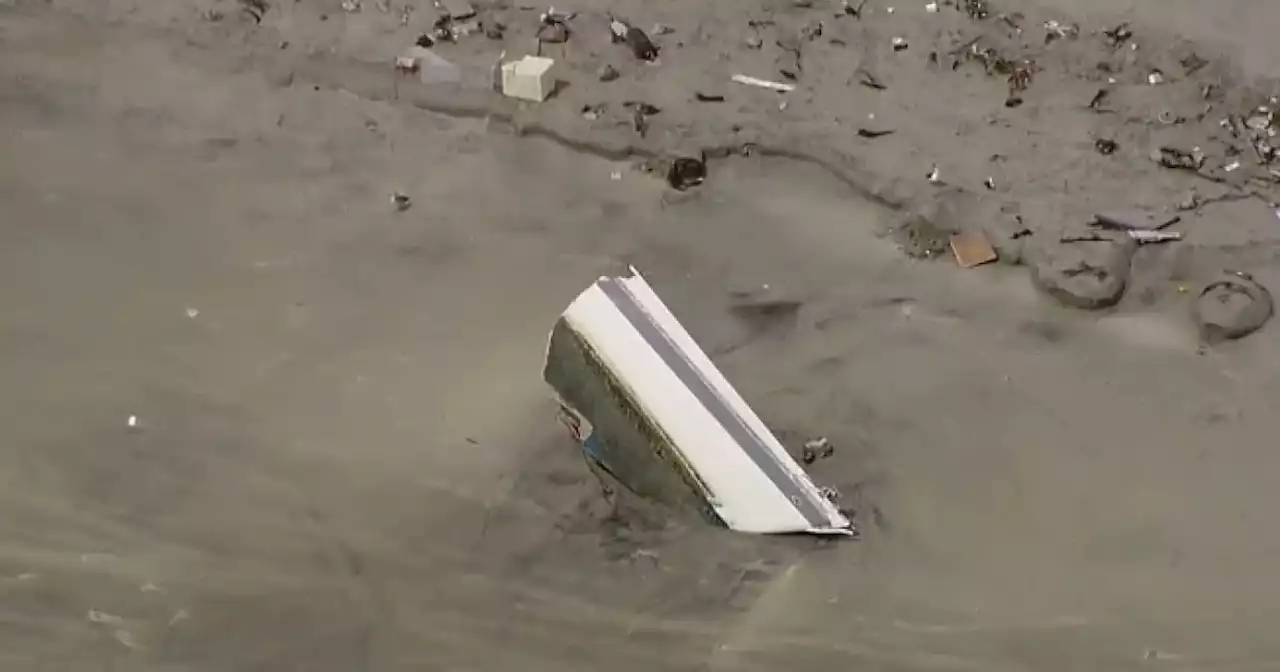 Seven boats wash ashore at Breakers Beach during Monday's powerful storm