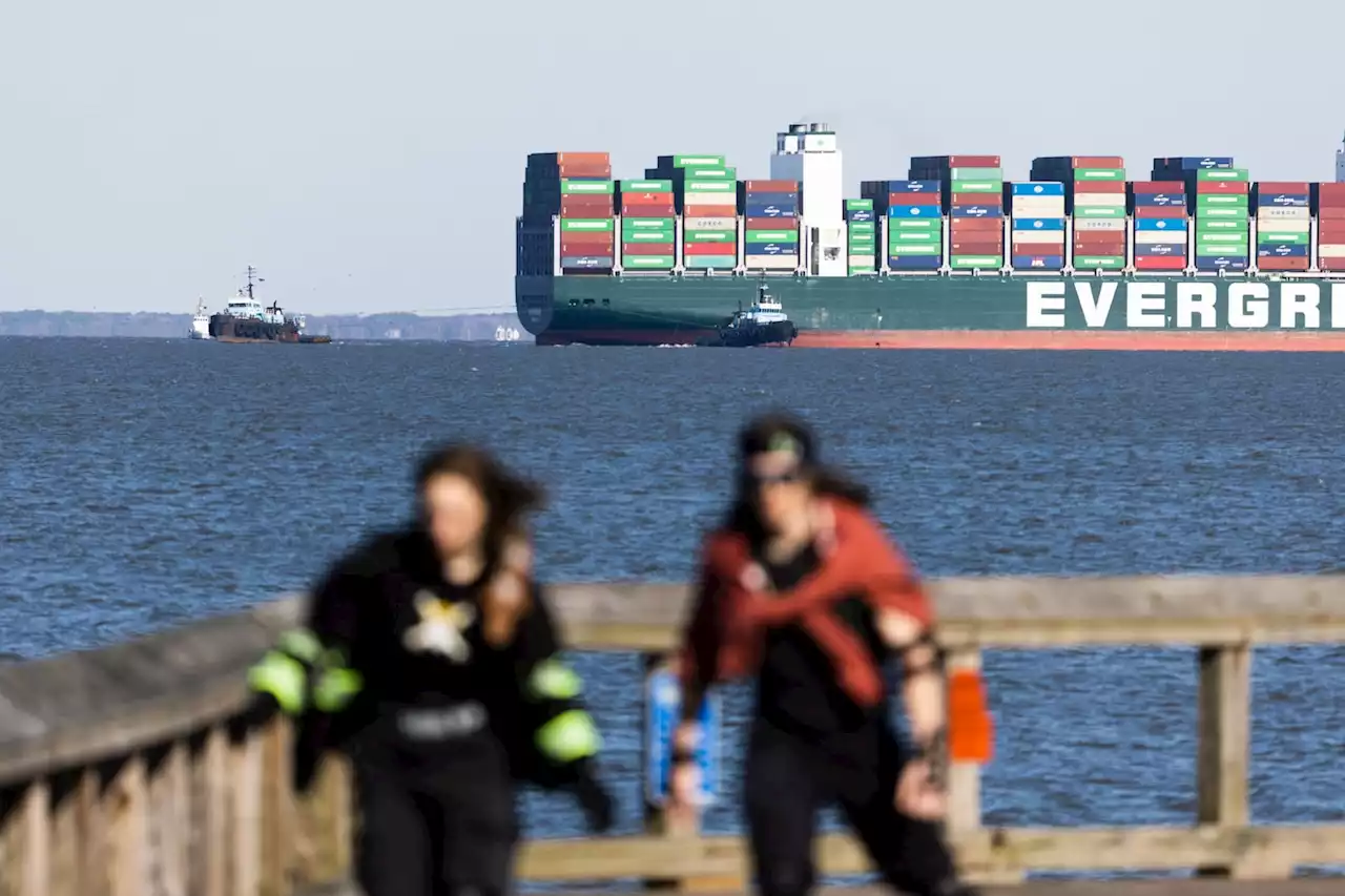 Tugboats fail to dislodge huge ship stuck in Chesapeake Bay