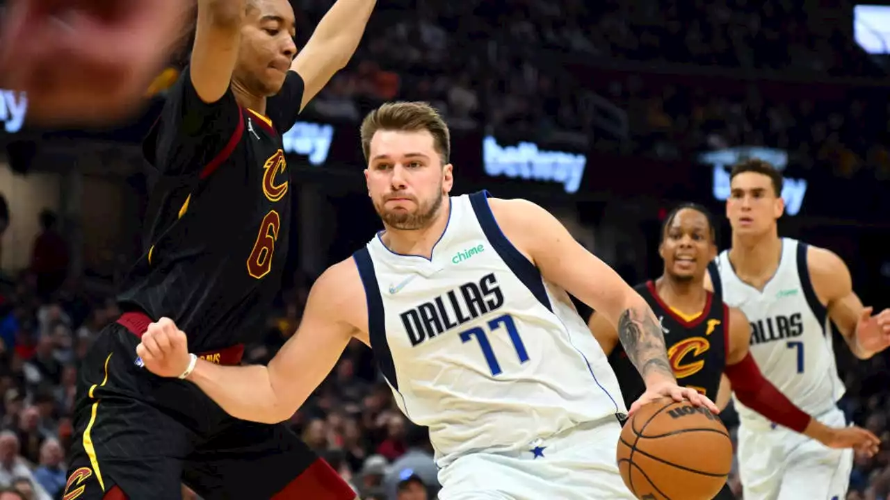 Doncic's 35 points, 13 assists send Mavs past Cavs 120-112