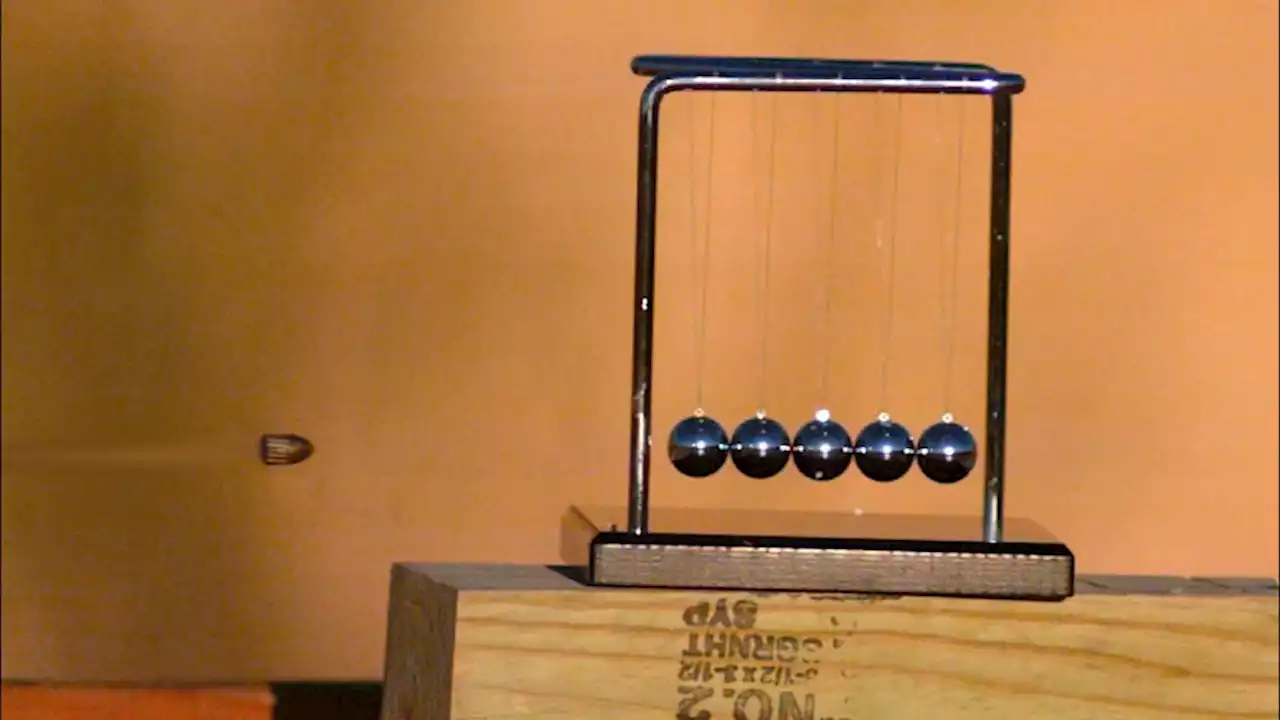 Watch 'Slo-Mo' YouTubers fire a bullet directly into a Newton’s cradle