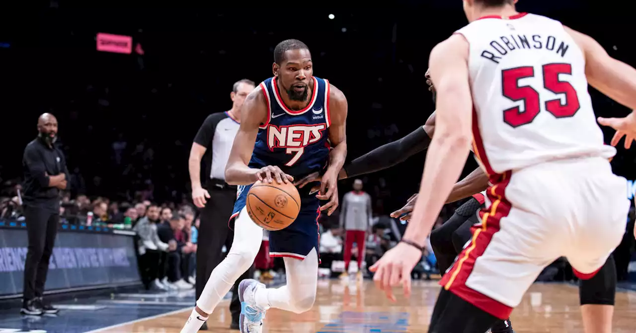 Durant has 31 in return but Heat rally to beat Nets