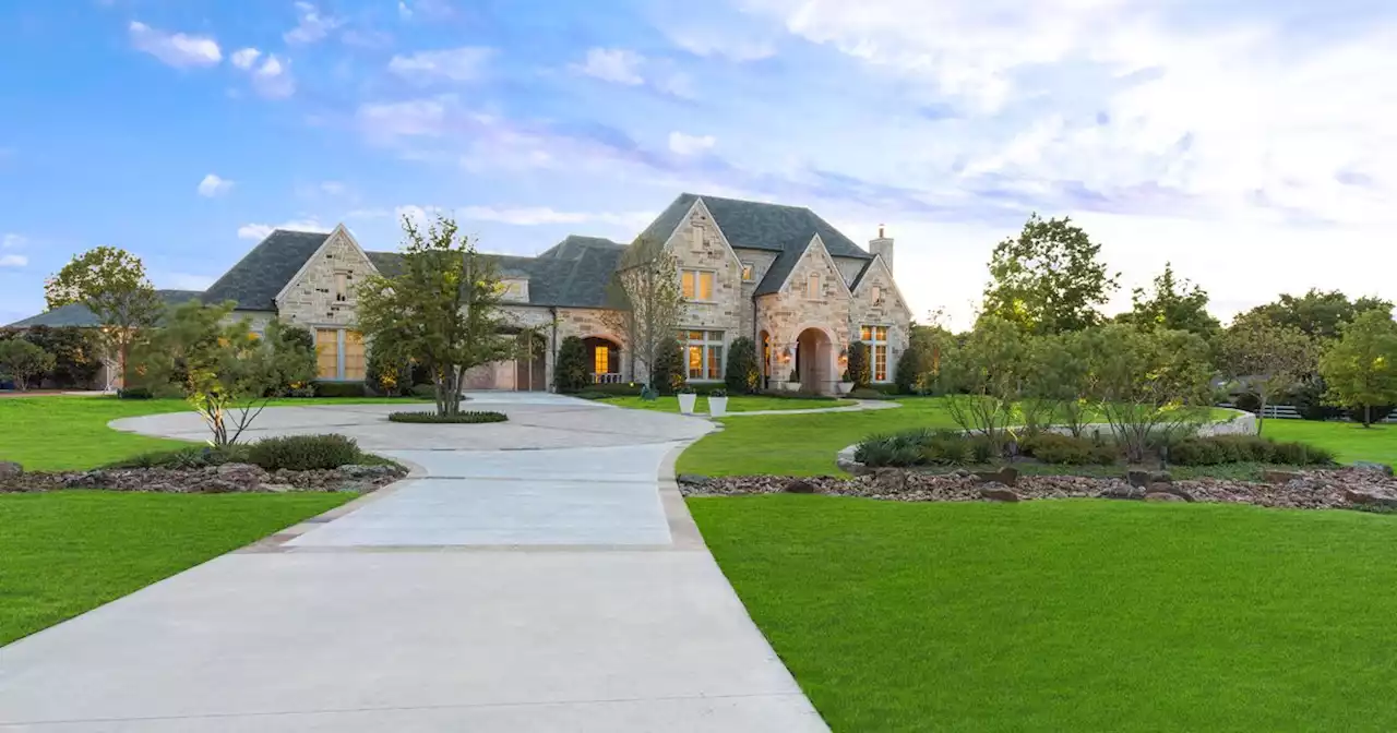 This house in Parker has a library, media room and space for golf in the backyard