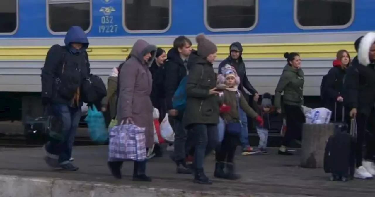 As hundreds of thousands of Ukrainians flee, many choose to stay behind: 'This is our country, not Russia's'