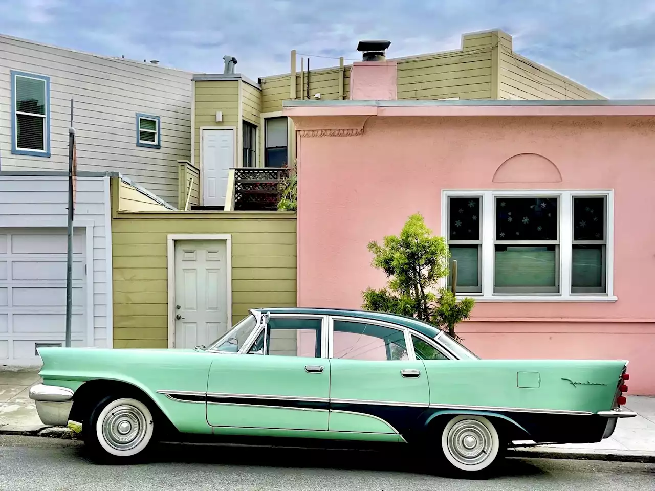 Capturing the beauty of SF Victorian homes and vintage cars