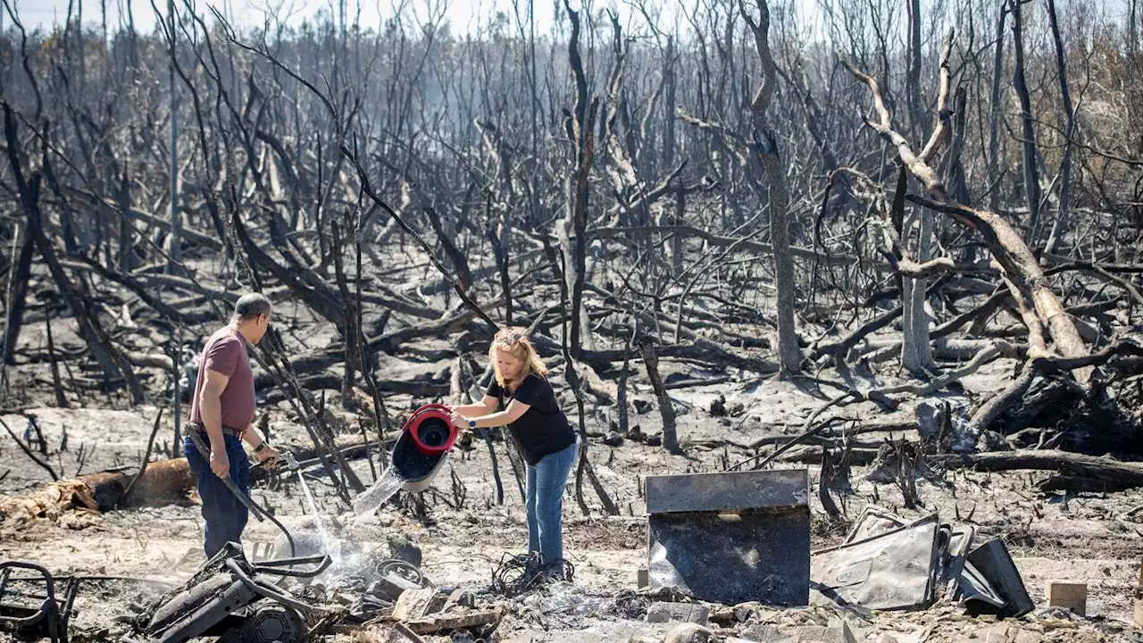 Firefighters battle 2 massive wildfires in Florida Panhandle