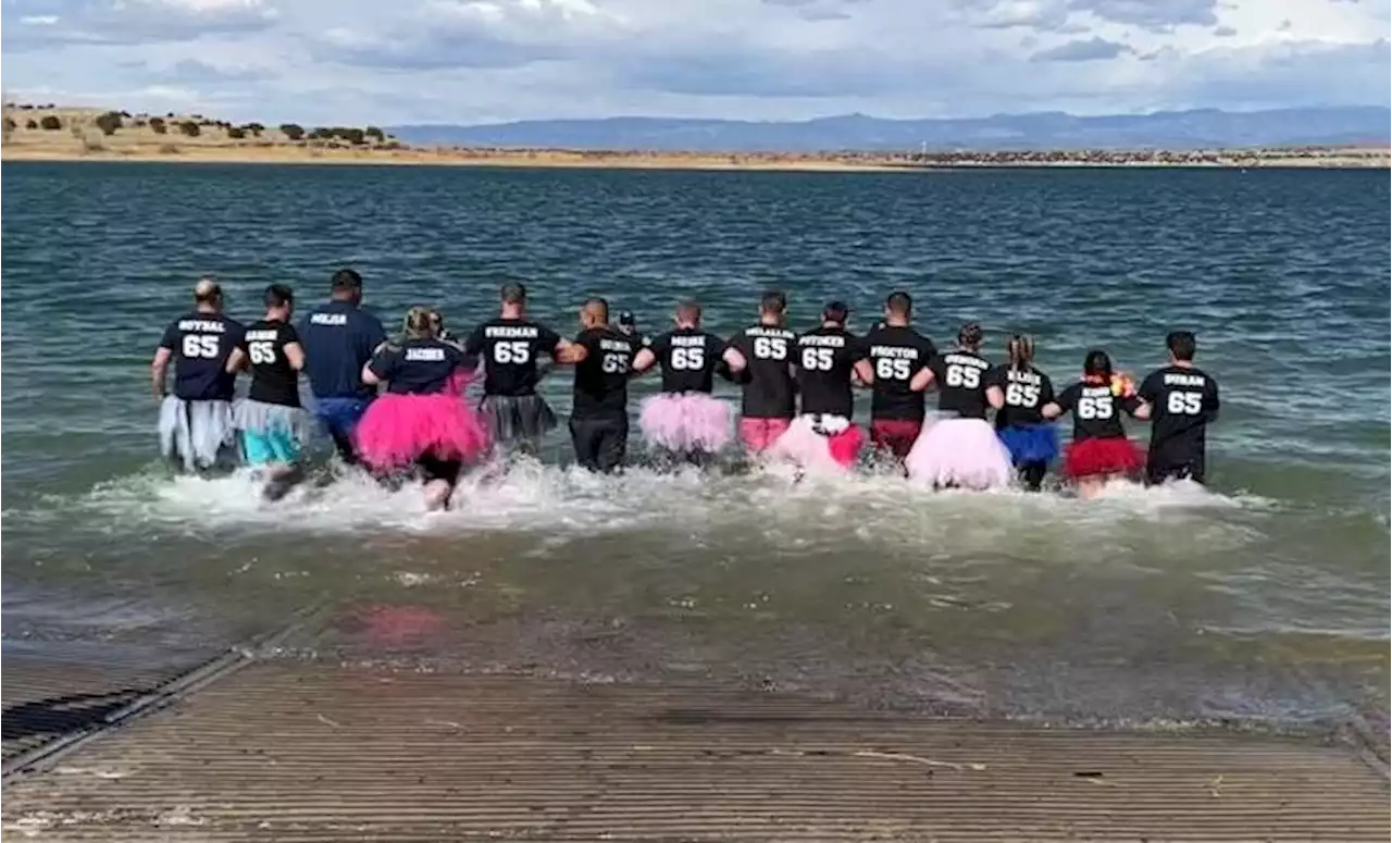 Brave Tutu-Wearing Coloradans Take Part In Polar Plunge At Pueblo Reservoir