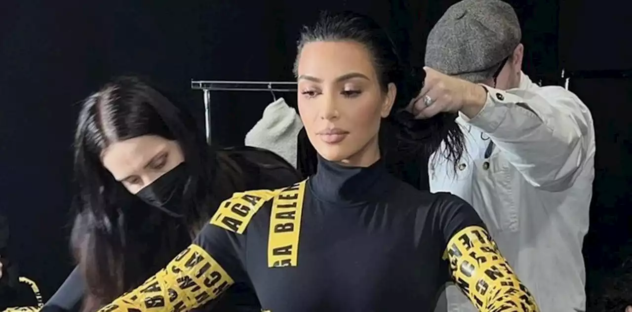 Kim Kardashian shares behind-the-scenes look of her getting ready in tape outfit