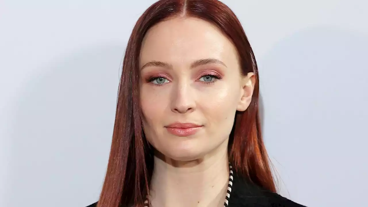 Sophie Turner covers figure in a leather pinafore dress amid pregnancy rumours