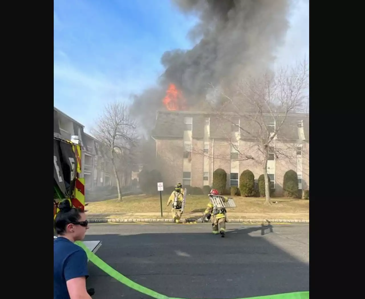 Toddler, dad drop from 2nd-floor balcony into arms of rescuers to escape N.J. blaze