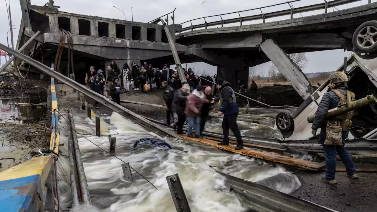 Escape Routes Are Land Mined as Tanks Arrive in Kyiv Suburbs