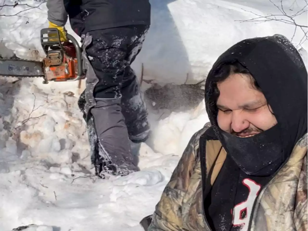 Snowmobilers used skills, body spray to survive slushy lake scare