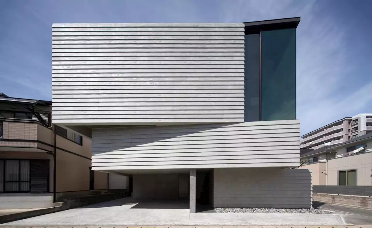 Angular house refreshes Japanese commuter town