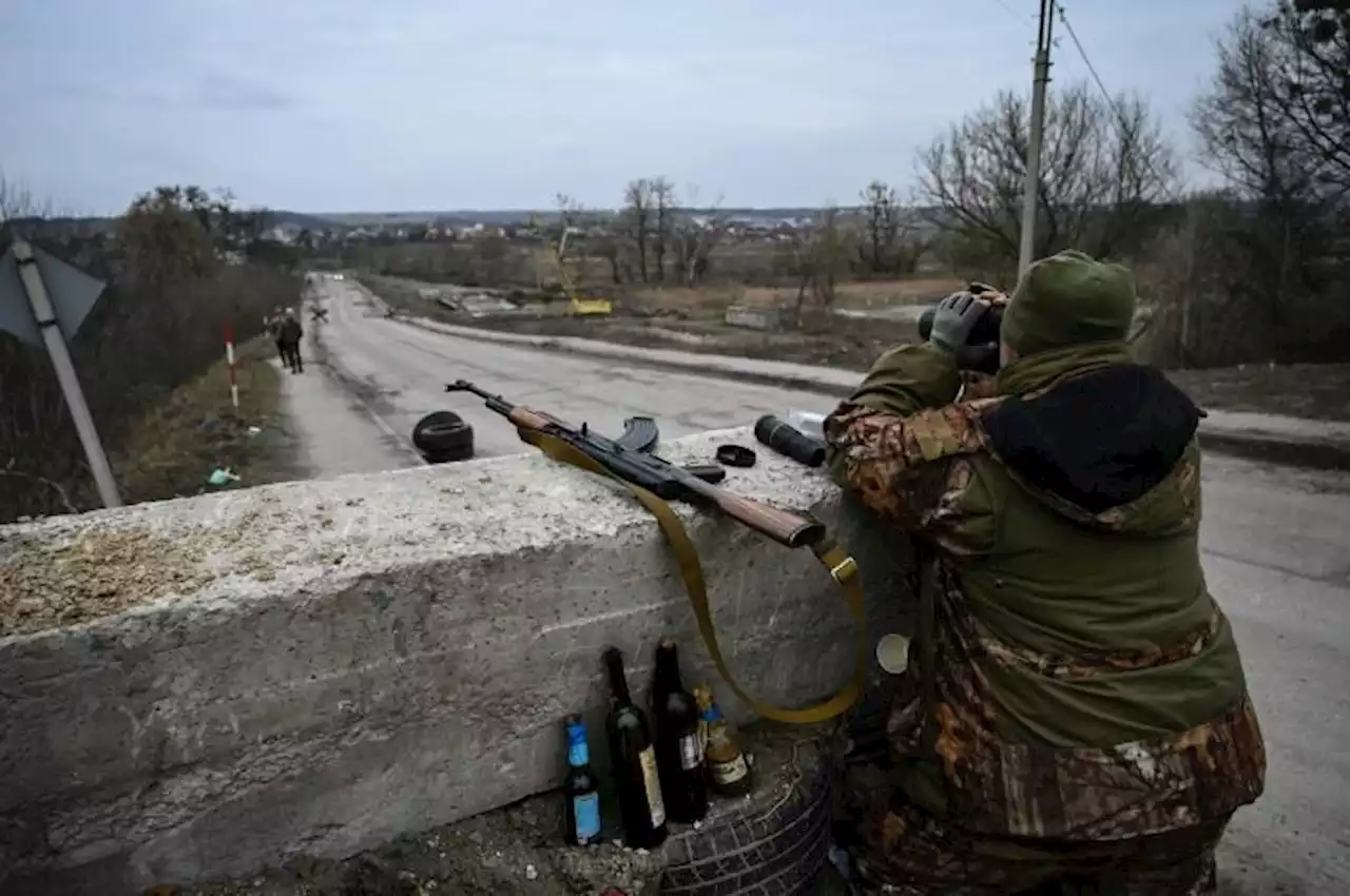 'We will blow it up': Last bridge to Kyiv stalls Russian advance