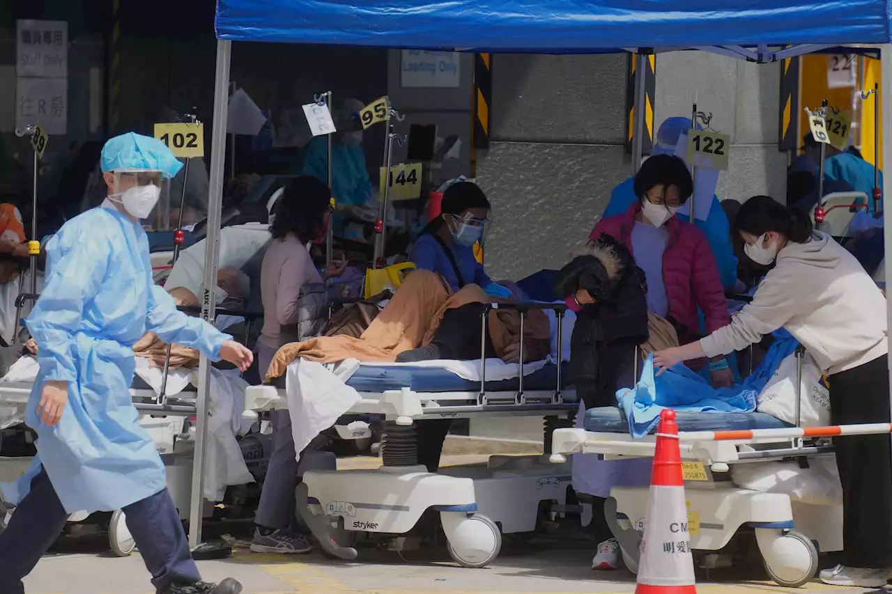 AP PHOTOS: Scenes from Hong Kong's COVID-19 crisis