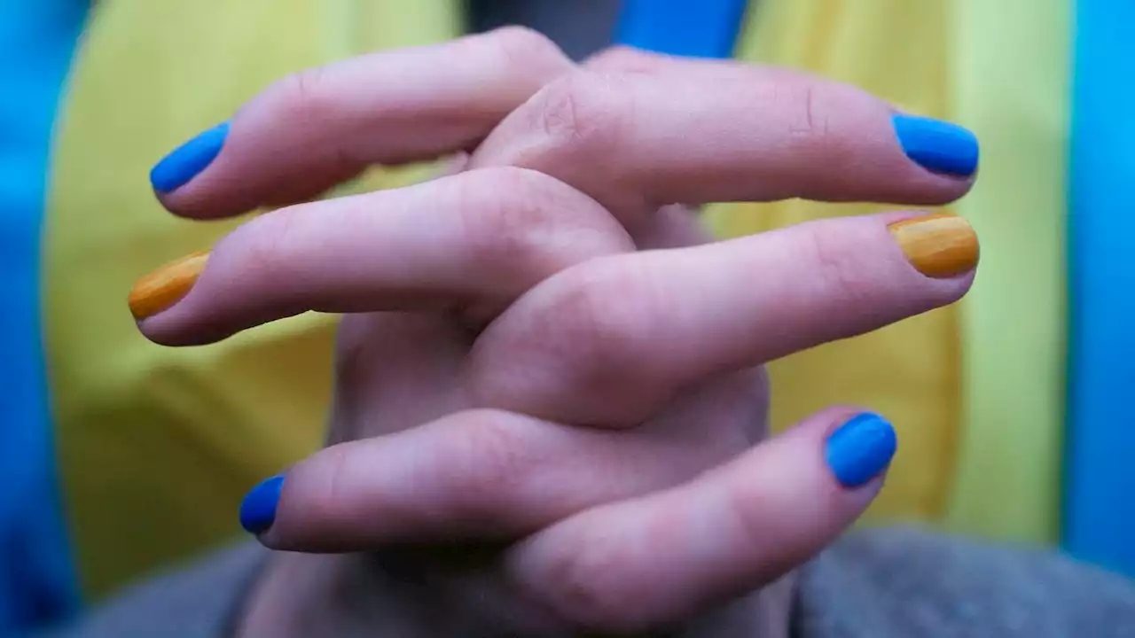 Jax Beach neighborhood draped in blue and yellow for Ukraine