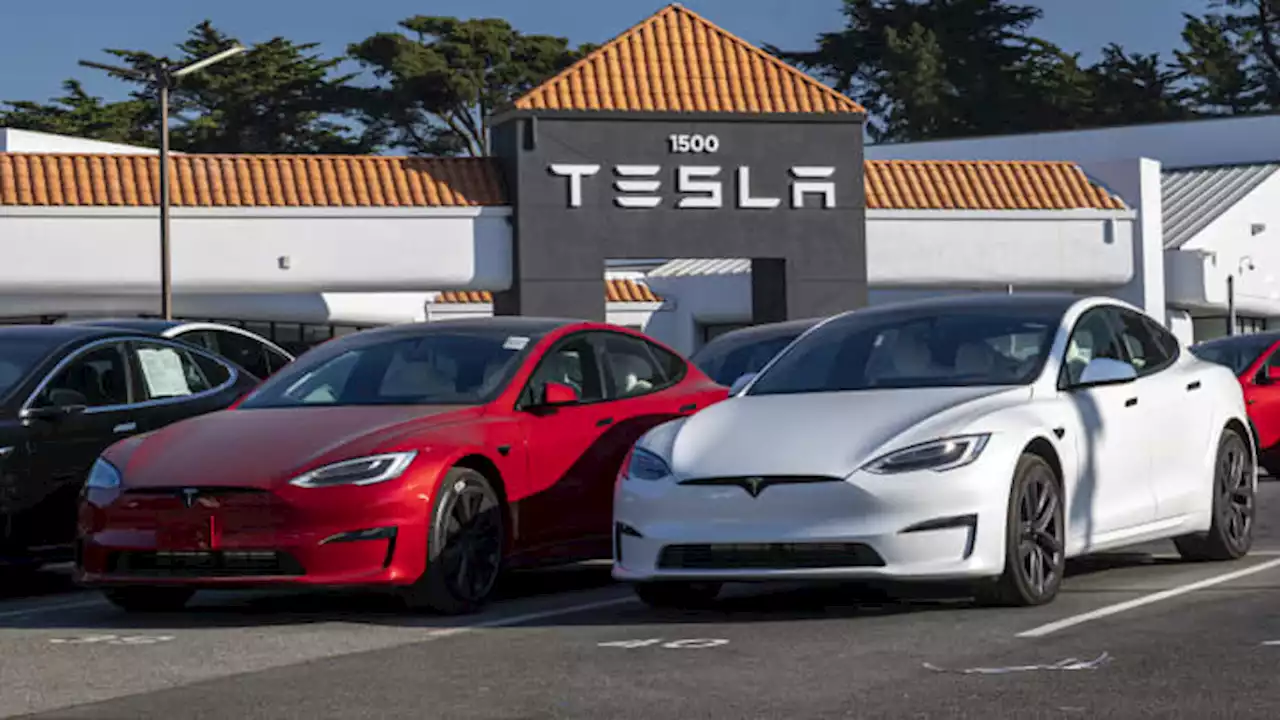 Here's Wall Street's take on how to play the auto market right now, covering Tesla, Rivian and more