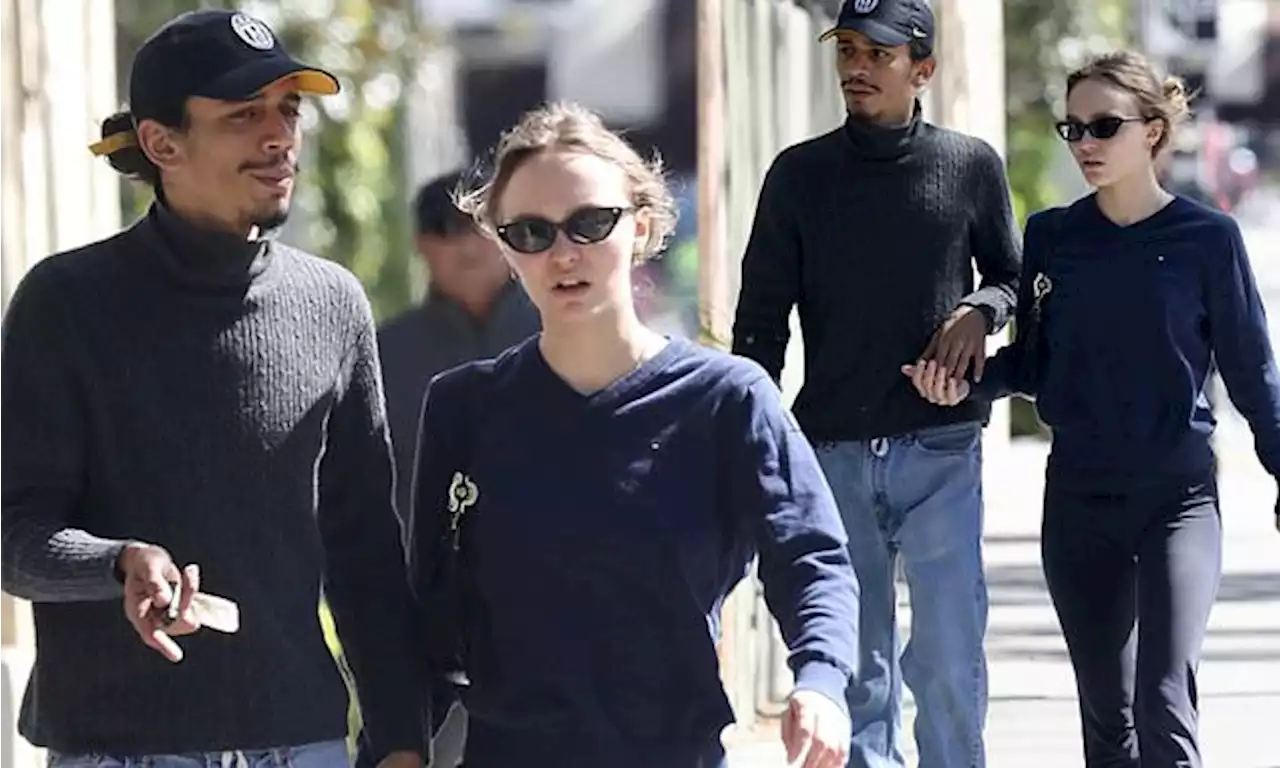 Lily-Rose Depp strolls hand in hand with rapper beau Yassine Stein