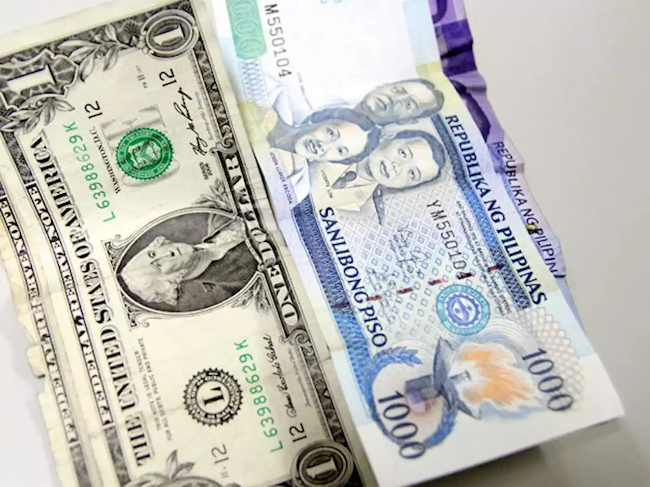 Peso breaches 52 vs dollar, first time in 2.5 years