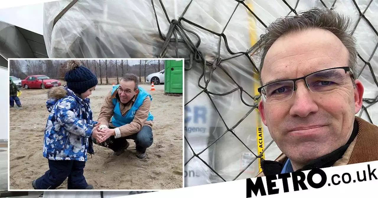 UN worker's tears on Ukraine border as refugee flow hits 2,000,000