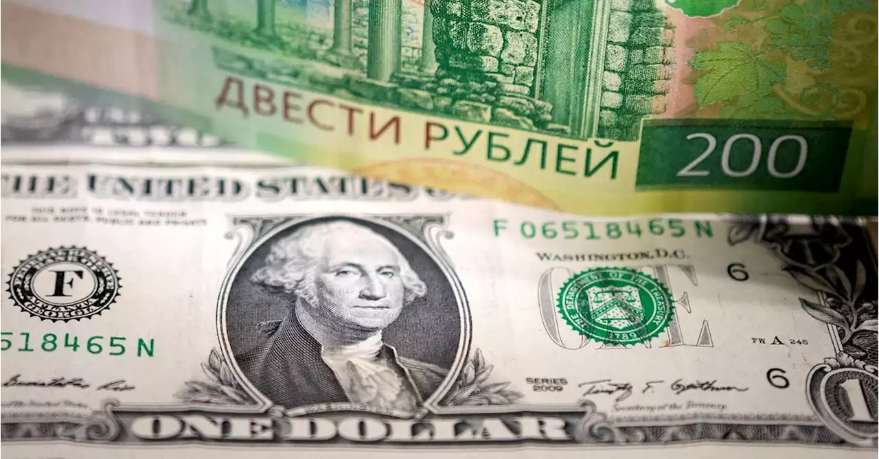 Russian rouble drops to record lows amid fresh sanctions