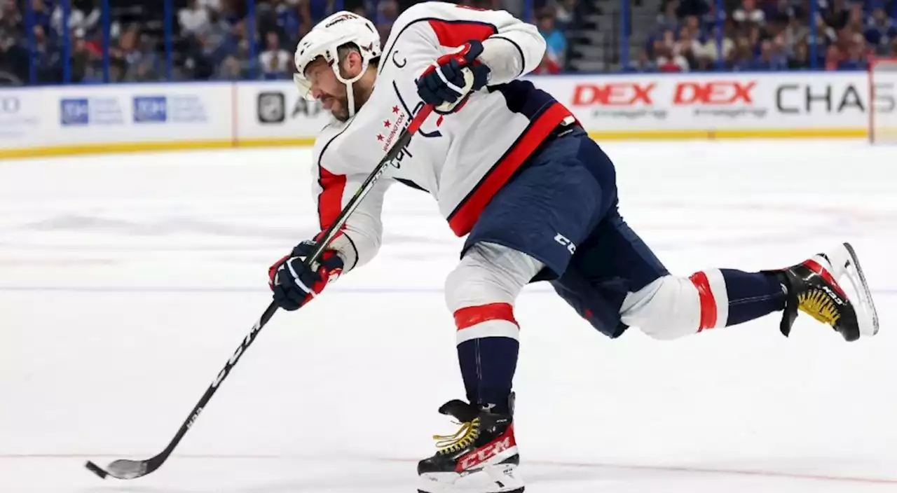 Ovechkin ties Jagr on scoring list as Capitals come back to down Flames