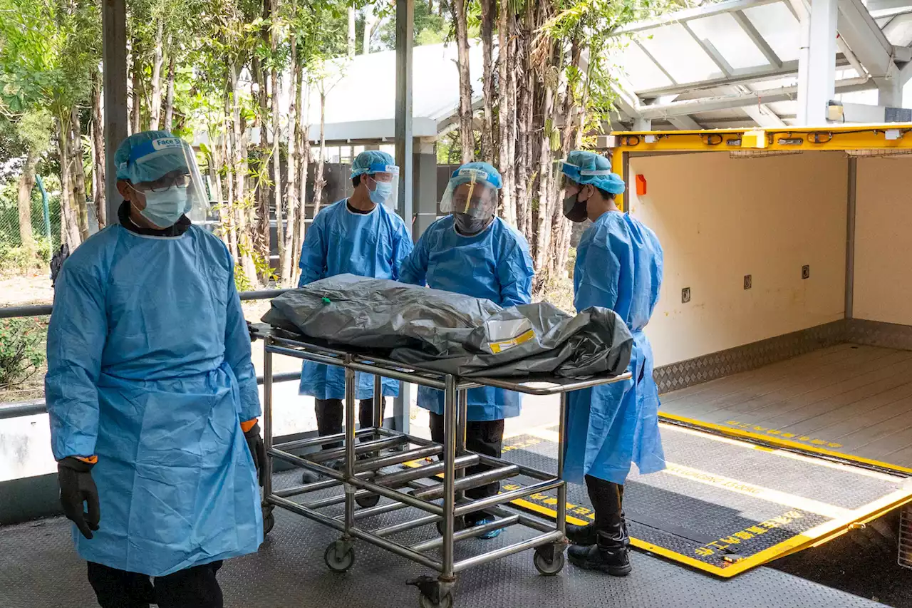 Body bags, overflowing morgues and chaotic hospitals: Hong Kong’s pandemic goes critical