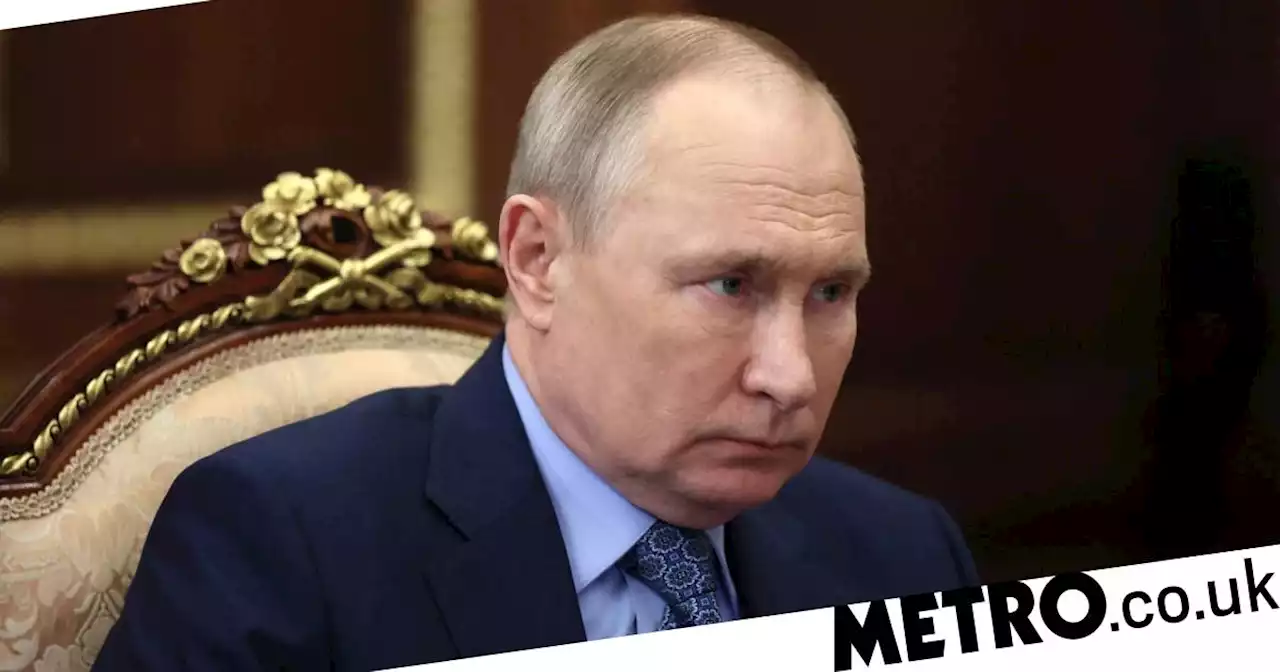 Putin 'constantly accompanied by cancer doctor' amid health speculation