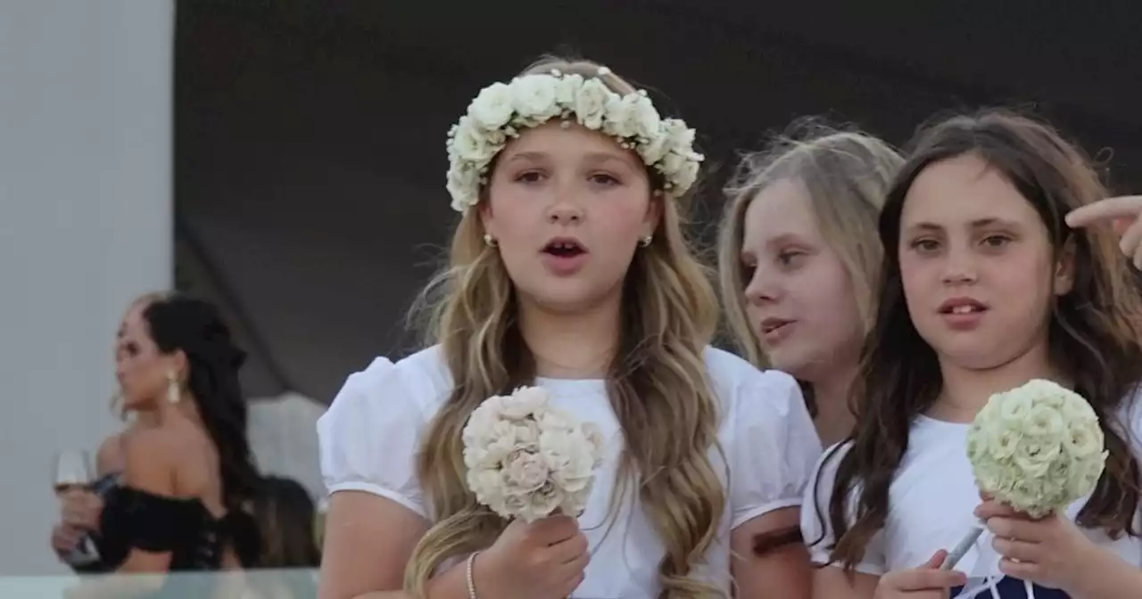 Harper Beckham looks angelic as bridesmaid at Brooklyn's wedding to Nicola Peltz