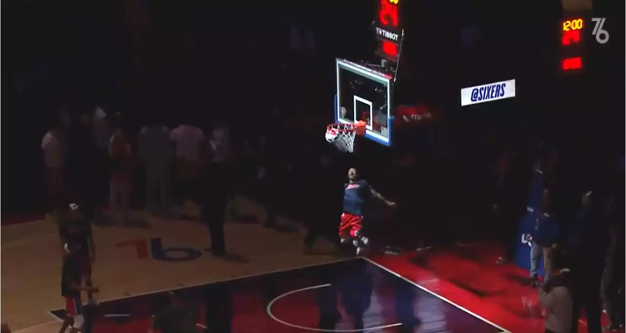 WATCH: Sixers Fan Makes Half-Court Shot To Win Free Season Tickets