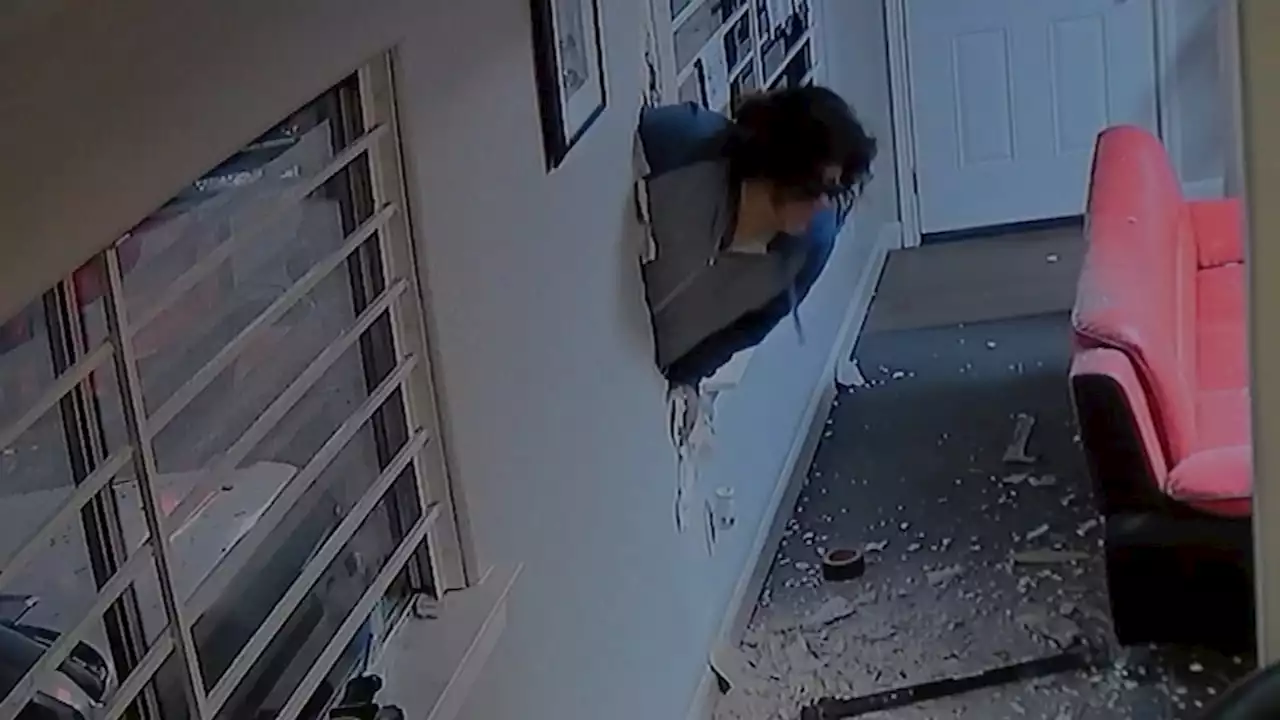 Woman breaks through wall of car dealership and steals Mercedes